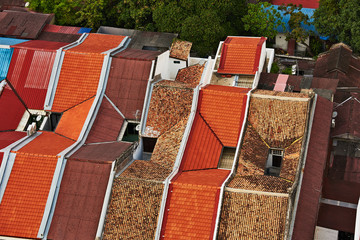 Wall Mural - view of the roof and rows of shophouses in the old town from the top of the hotel Neo in George Town, Penang island / Malaysia