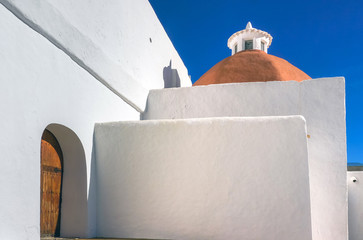 Mediterranean traditional architecture in Ibiza: white small church in Santa Eularia des Riu