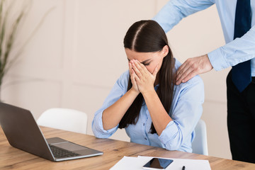 Unrecognizable Boss Sexually Harassing Employee Lady At Workplace, Cropped