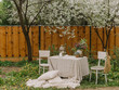Tables decorated in the spring garden for a photoshoot or wedding reception with lilac