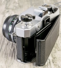 35mm analog film camera backdoor release wind on lever with open film compartment