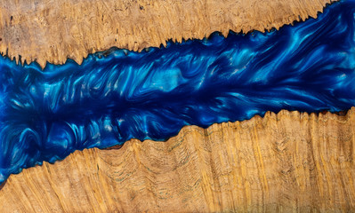 Canvas Print - Casting epoxy resin Stabilizing maple wood background texture