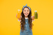 © be free - Berries in my bottle. Fruit energy. Smiling kid hold smoothie bottles. Healthy food. Vitamin nutrition. Fresh smoothie. Girl drinking orange fresh smoothie. Vegetarian concept. Vitamin juice