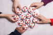 © JCDphoto - Red velvet cupcake and people hands