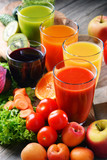Glasses with fresh organic vegetable and fruit juices