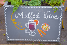 Handwritten Sign Mulled And Simple Drawing Of A Mulled Wine Glass With Orange And Cinnamon. Original Ad Attracting People To Buy Hot Wine In The Winter Season.