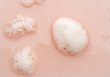 © KONSTANTIN - pink shower gel with foam, background, texture