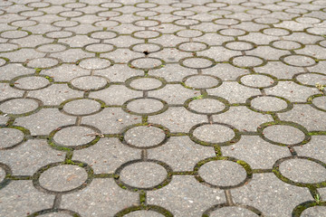 Stone pavement texture. Abstract background of old cobblestone pavement