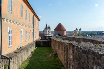 Wall Mural - The inner court of the Eger Castle in Hungary on a sunny afternoon with the Dobo bastion in the background.