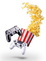 Canvas Print - Flying popcorn and video game joystick gamepad isolated on a white background