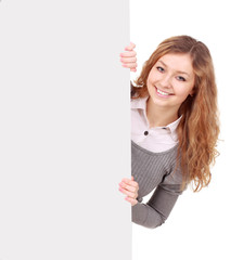 woman holding sign - Portrait of a beautiful woman holding a blank billboard.