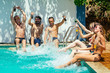 © yurakrasil - aquamarine color swimmingpool friends chillout in hot summer