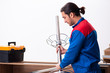 © Elnur - Young handsome male carpenter working indoors