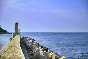 Wall Mural - The lighthouse at the Port of Nice on the Mediterranean Sea at Nice, France along the French Riviera.