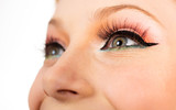 Fototapeta Panele - Beautiful female eye with pinup makeup. Close up retro pin up make up.