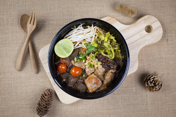 kanom jeen nam ngeaw spicy noodle with pork; thai northern food