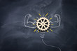 © tomertu - Education concept image. Creative idea and innovation. Wooden gears light bulb metaphor over blackboard