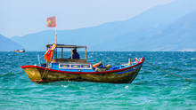 Vietnamese Boat On A Blue Sea