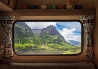 Wall Mural - Green hills in the Scottish highlands, view from camper window