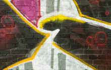 Abstract Graffiti Detail On A Brick Wall
