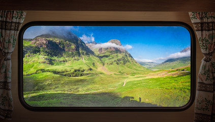 Wall Mural - Sunrise at Glencoe in Scotland, view from camper window