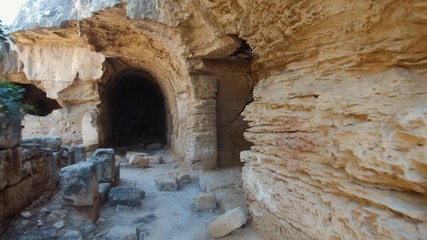 Wall Mural - Video of walk in St. Lambrianos catacomb. Paphos Archaeological Park. Cyprus