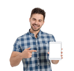 Canvas Print - Young man with tablet computer on white background