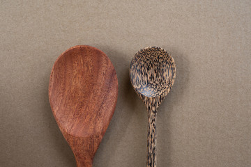 Close up spoon wooden on wood texture.