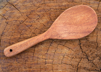 Close up spoon wooden on wood texture.