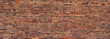 Old red Brick wall background. Wide panoramic view of masonry