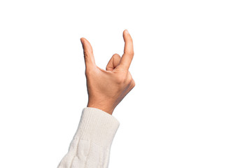 Hand of caucasian young man showing fingers over isolated white background picking and taking invisible thing, holding object with fingers showing space