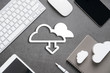© alice_photo - Cloud technology icon for global business concept on a desk from top view