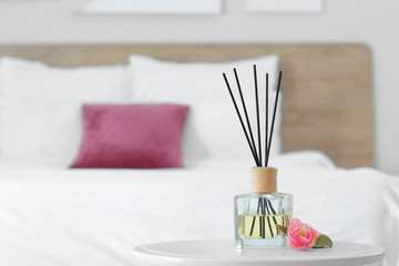 Poster - Reed diffuser on table in bedroom