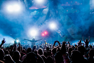 people dancing in a summer music festival