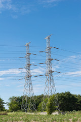 transmission High voltage electricity pylon with blue sky background