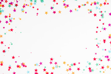 Wall Mural - festive white background with confetti. holiday concept on white background. birthday, wedding, part