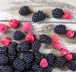 Mixed fresh fruits raspberries and blackberries