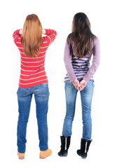 Wall Mural - Back view of two woman in sweater.