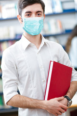 Wall Mural - Student portrait wearing a mask, coronavirus concept