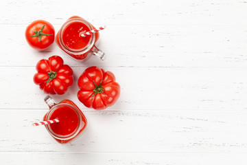 Wall Mural - Fresh tomato juice and ripe tomatoes