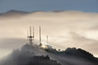 © Cavan Images - View of radio towers on Mount Wilson during fog