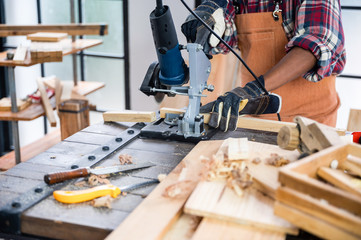 concept of wood DIY at home, carpenter working with wood