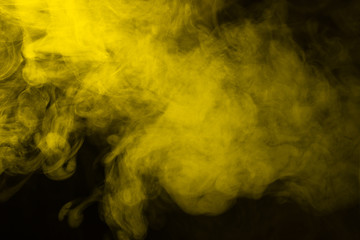 Yellow steam on a black background.