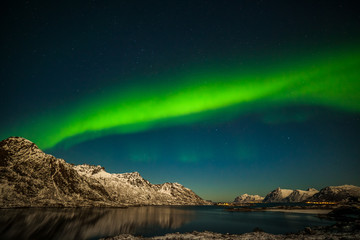 nature of norway, amazing northern lights, aurora borealis over the mountains in the north of europe
