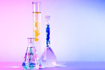 laboratory glassware with colorful liquid