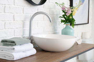 Poster - Interior of bathroom with fresh flowers