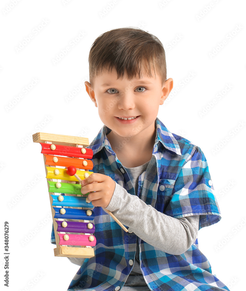 Little boy with toy on white background