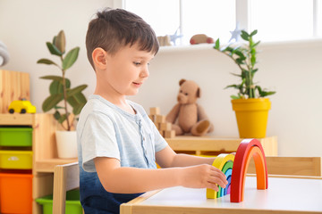 Poster - Little boy playing at home