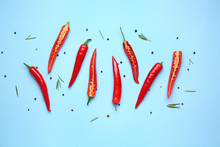 Hot Chili Pepper On Color Background