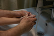 © Анастасия  - washing hands with soap.  Washing a child’s hands with soap and water to prevent coronavirus and hygiene to stop the spread of coronavirus. wash your hands with soap and hot water